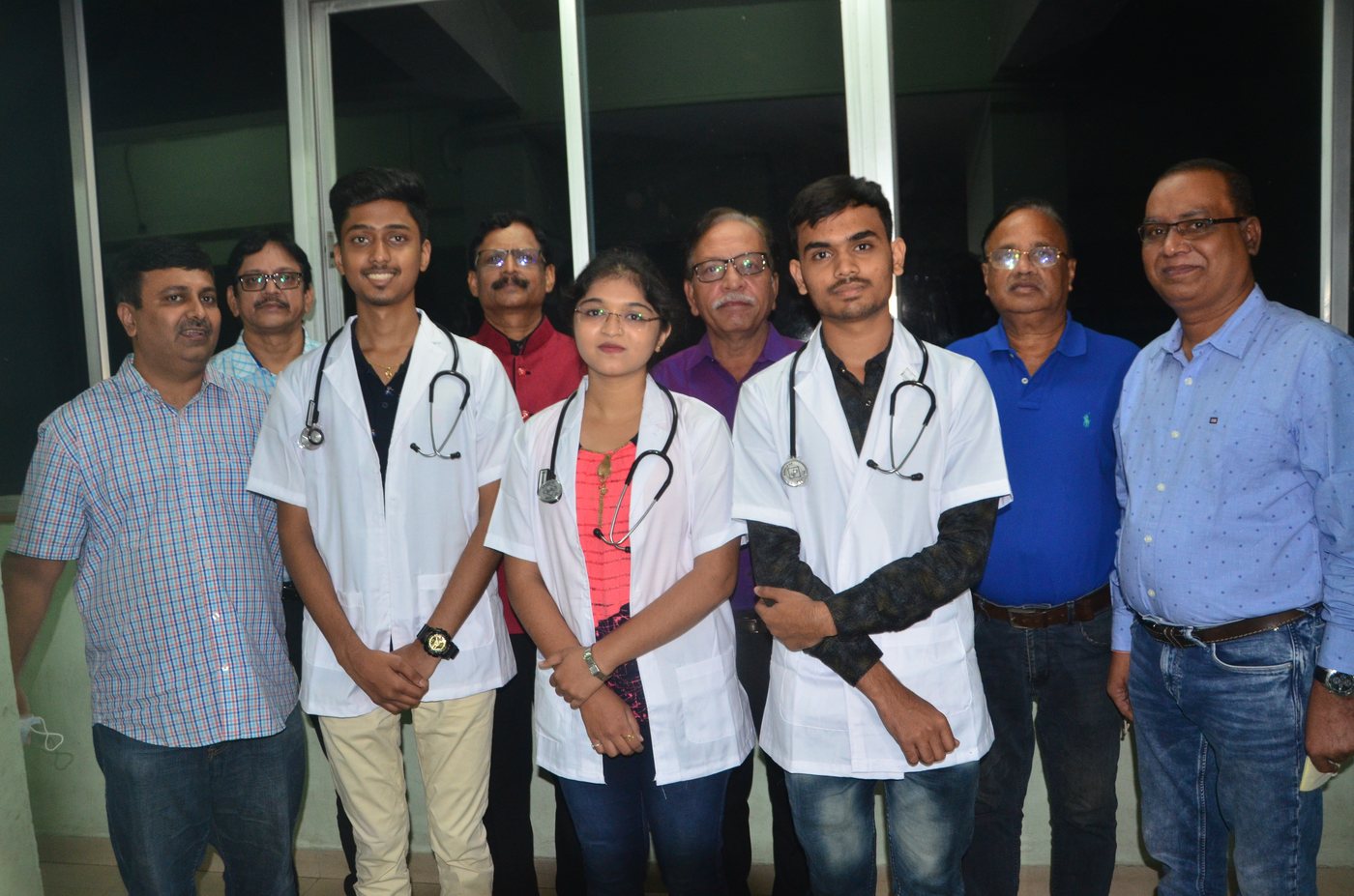 DDS Academy students in white coats and stethoscopes